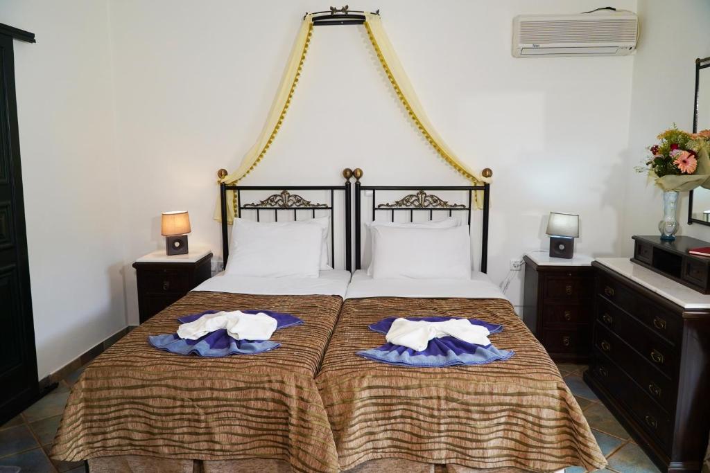 Двухместный (Улучшенный двухместный номер с 1 кроватью) апарт-отеля Vasilaras Hotel, Агистри