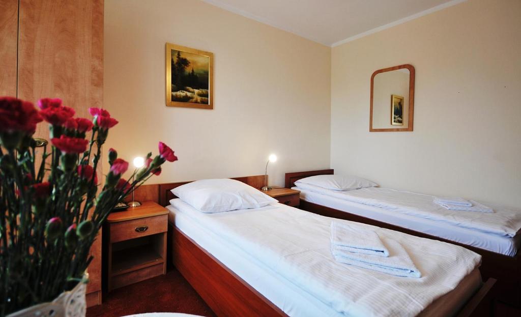 Двухместный (Стандартный двухместный номер с 2 отдельными кроватями) отеля Dworek Familijny, Колобжег