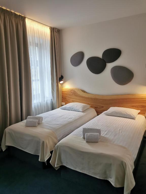 Двухместный (Стандартный двухместный номер с 2 отдельными кроватями) отеля Dunetton, Клайпеда