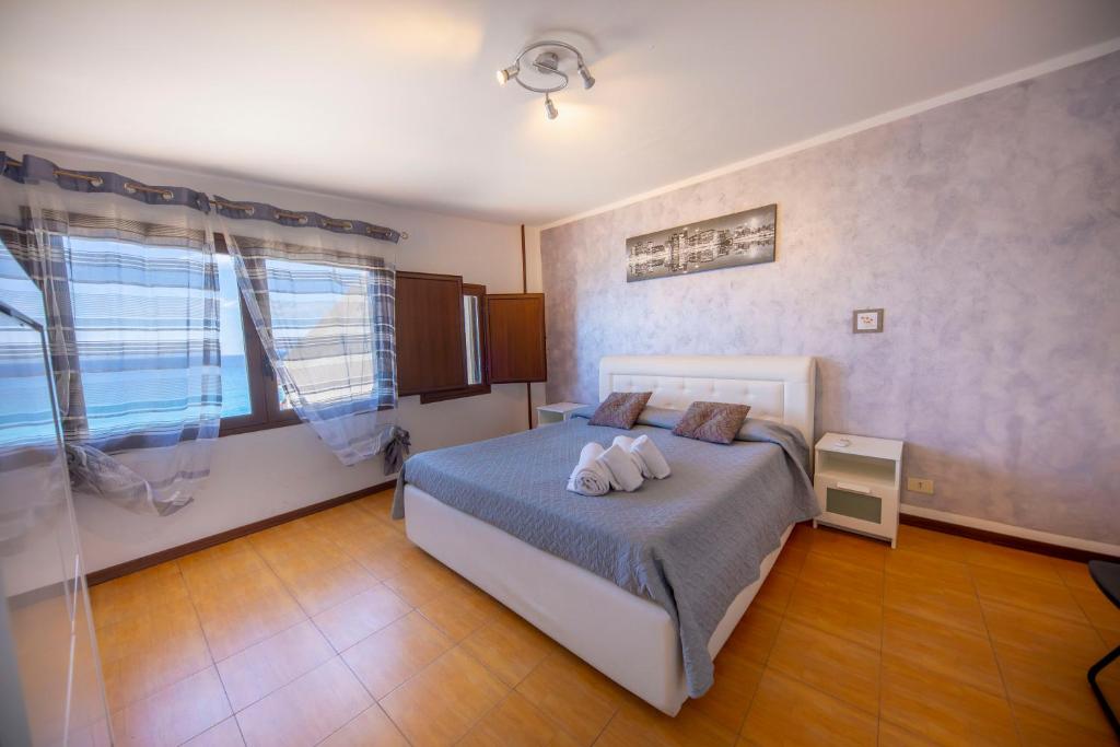 Четырехместный (Четырехместный номер с собственной ванной комнатой) гостевого дома Albachiara Apartments, Чефалу