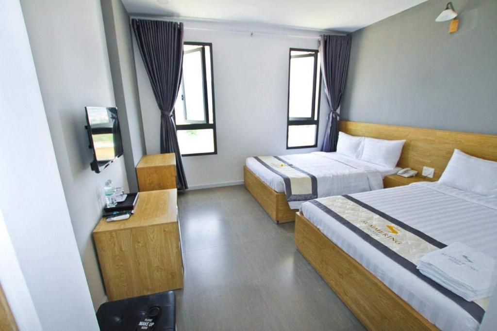 Двухместный (Улучшенный двухместный номер с 2 отдельными кроватями и видом на море) отеля Summering Hotel, Нячанг