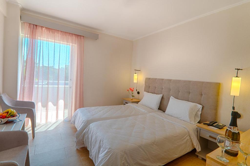Двухместный (Двухместный номер с 1 кроватью или 2 отдельными кроватями) отеля Livadi Nafsika Hotel, Дассия