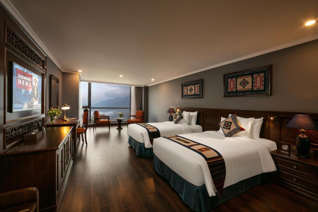 Двухместный (Улучшенный двухместный номер с 1 кроватью или 2 отдельными кроватями, вид на горы) отеля Pistachio Hotel Sapa, Сапа