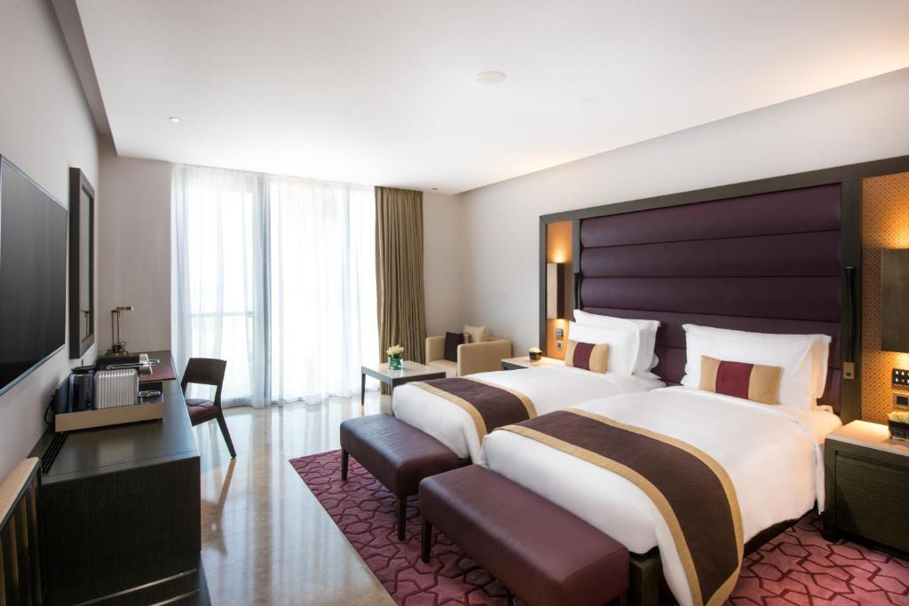 Двухместный (Двухместный номер Делюкс с 2 отдельными кроватями) отеля Kempinski Hotel Muscat, Маскат