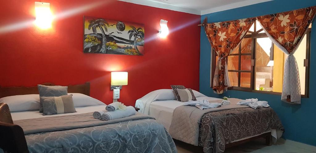 Двухместный (Стандартный двухместный номер с 2 двуспальными кроватями) отеля Hotel Maya, Коба