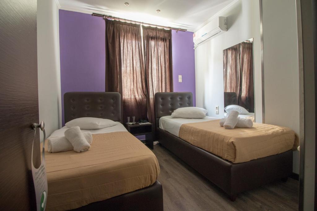 Двухместный (Двухместный номер с 2 отдельными кроватями) отеля Cosmopolit, Афины