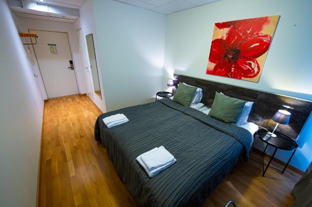Двухместный (Двухместный номер с 2 отдельными кроватями) хостела Uppsala Hostel Kvarntorget, Уппсала