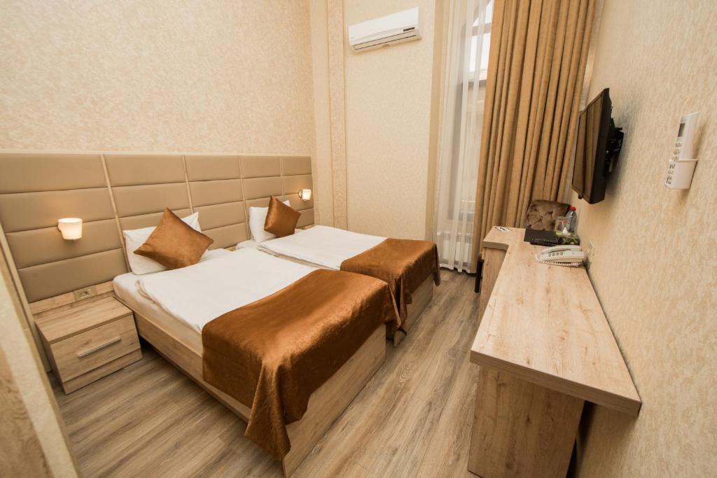 Двухместный (Стандартный двухместный номер с 2 отдельными кроватями) отеля Пассаж, Баку