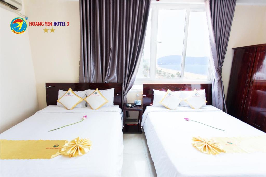 Четырехместный (Четырехместный номер Делюкс) отеля Hoang Yen Hotel 3, Куинён