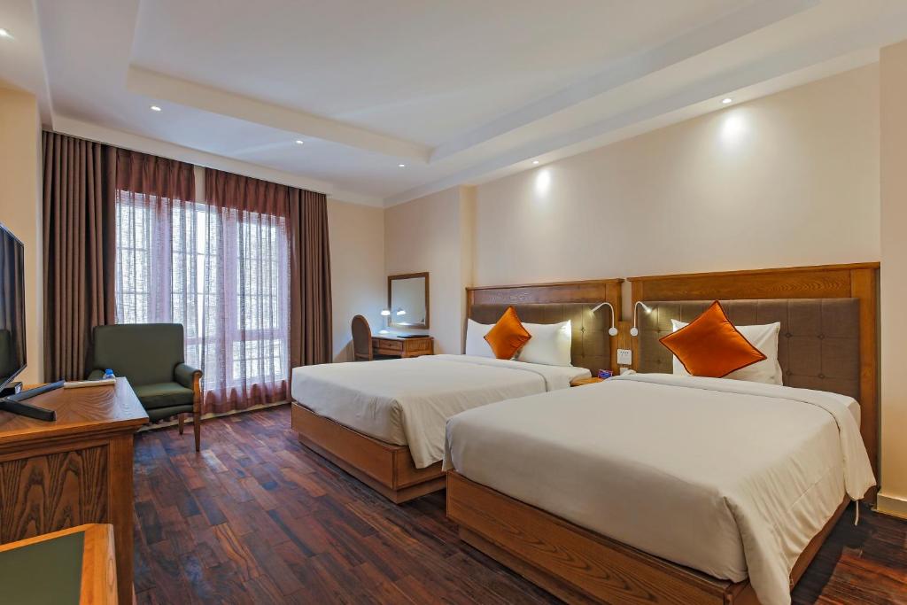 Трехместный (Роскошный трехместный номер) отеля Hoang Lan Hotel, Хошимин