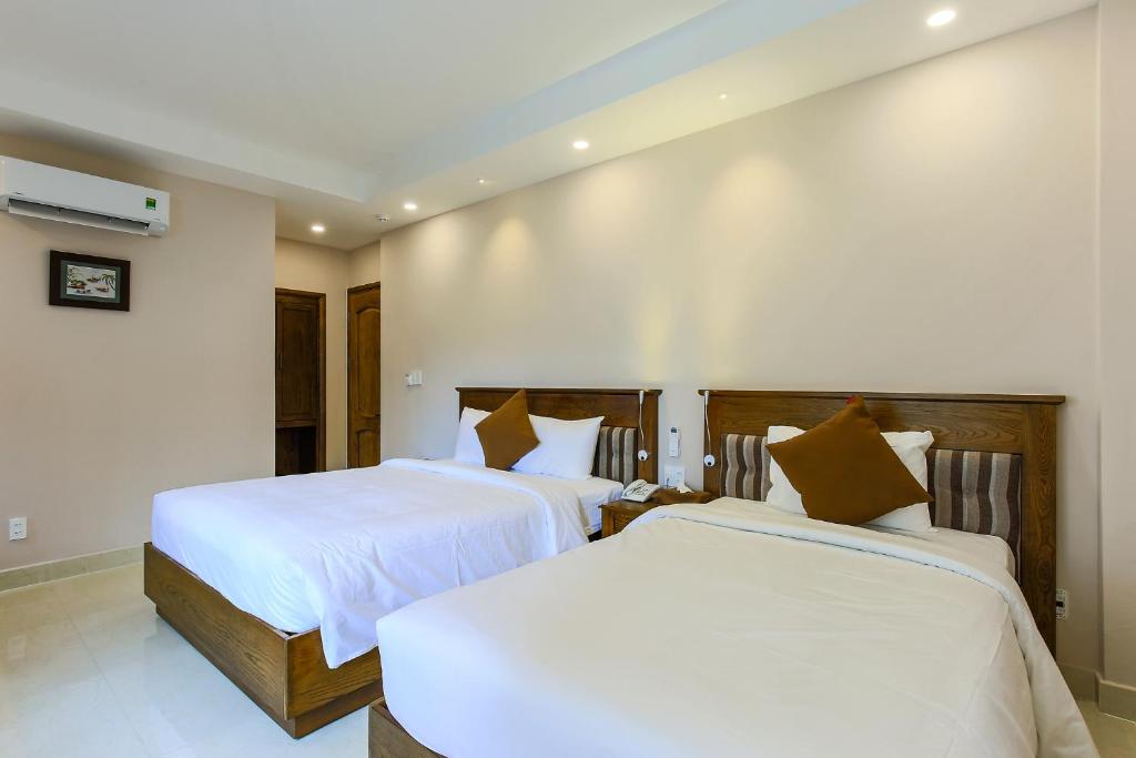 Трехместный (Трехместный номер) отеля Hoang Lan Hotel, Хошимин