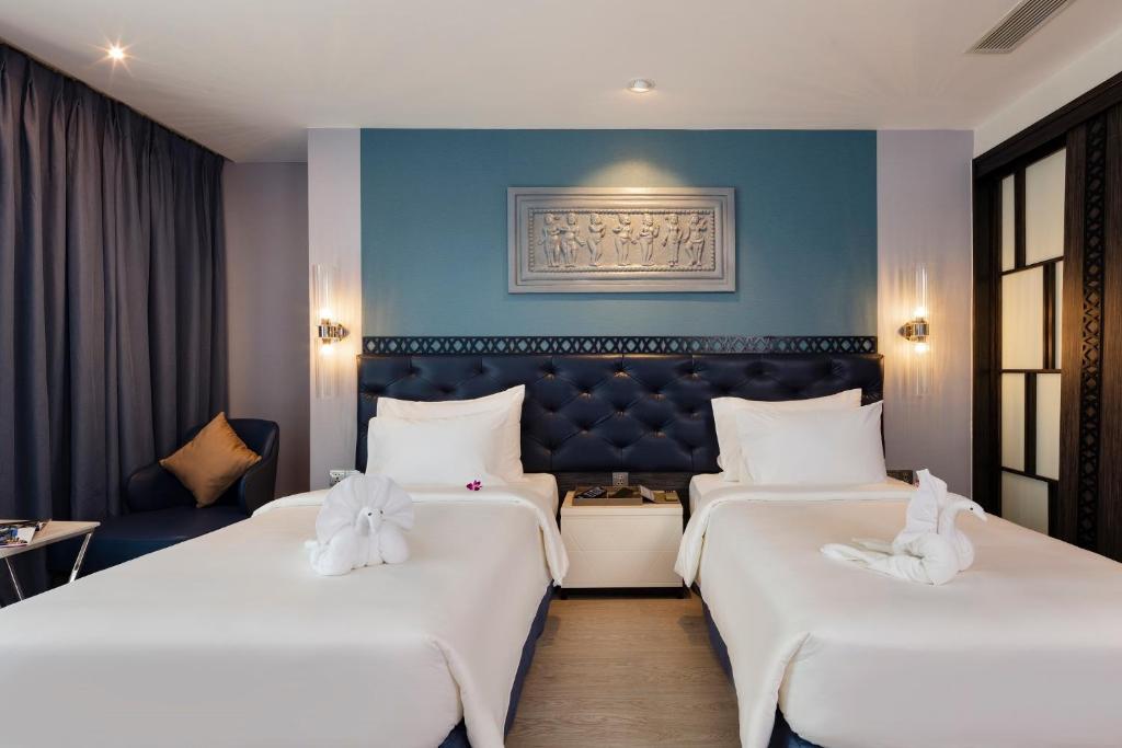 Двухместный (Двухместный номер с 1 кроватью или 2 отдельными кроватями) отеля Erica Nha Trang Hotel, Нячанг
