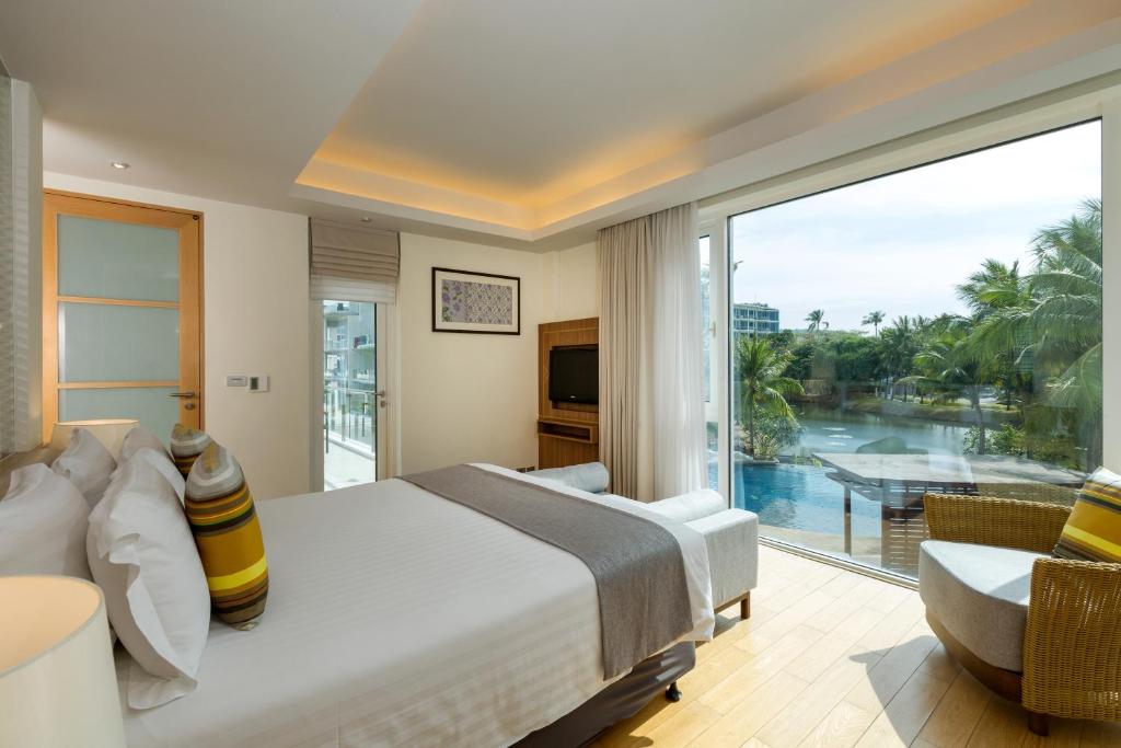 Сьюит (LB1B: Люкс Residence с 1 спальней, кухней и балконом) курортного отеля Grand West Sands Resort & Villas Phuket, Пхукет