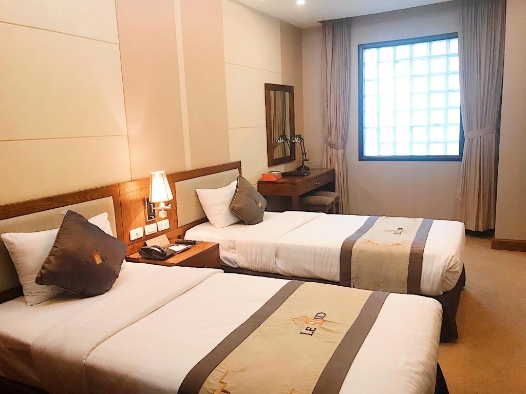 Двухместный (Улучшенный двухместный номер с 1 кроватью или 2 отдельными кроватями) отеля Lenid Hanoi Hotel, Ханой