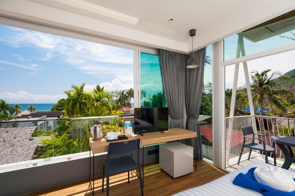 Двухместный (Двухместный номер Делюкс с 1 кроватью или 2 отдельными кроватями и видом на море) курортного отеля Sai Ree Hut Resort, Ко Тао