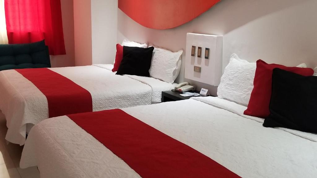 Двухместный (Номер Делюкс с 2 кроватями размера «queen-size») отеля Hotel Dluxe and Suites, Сан-Хуан-де-лос-Лагос