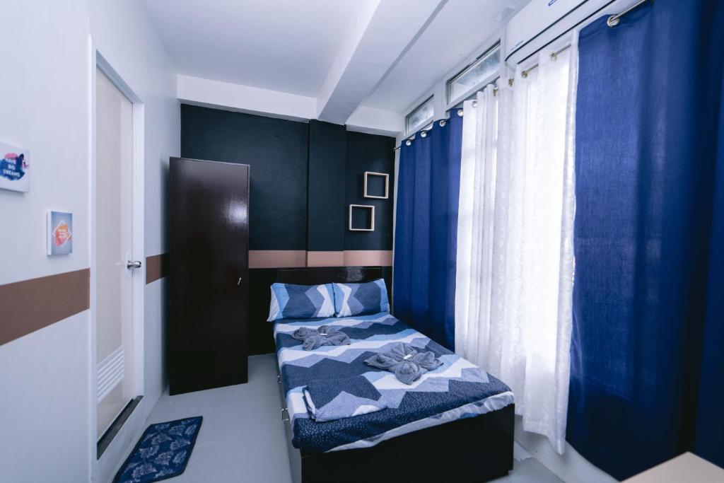 Двухместный (Бюджетный двухместный номер с 1 кроватью) хостела Napsule Suites, Давао