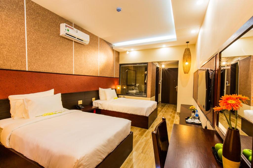 Двухместный (Улучшенный двухместный номер с 2 отдельными кроватями) отеля Hamya Hotsprings and Resort, Куангнгай