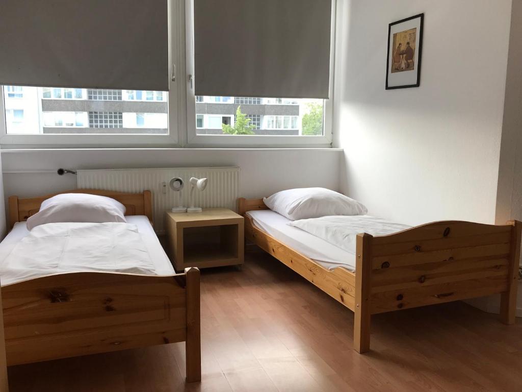 Двухместный (Двухместный номер с 1 кроватью или 2 отдельными кроватями - Подходит для гостей с ограниченными физическими возможностями) гостевого дома City Inn, Берлин