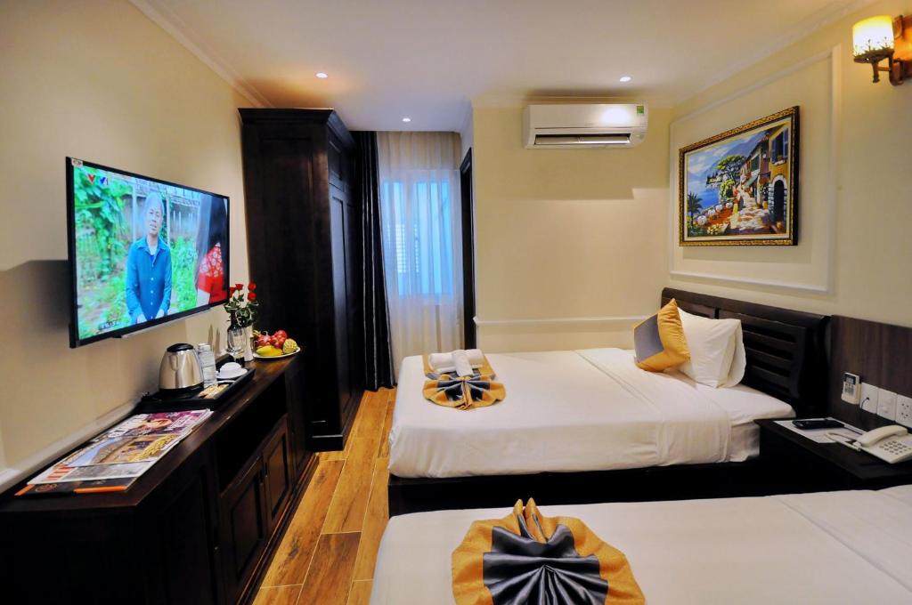 Двухместный (Улучшенный двухместный номер с 2 отдельными кроватями) отеля APOLLO HOTEL managed by NEST Group, Нячанг