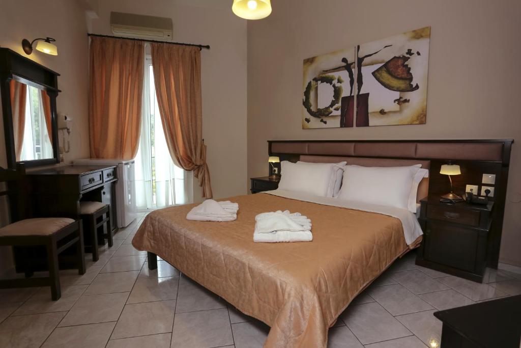 Двухместный (Двухместный номер с 1 кроватью или 2 отдельными кроватями и видом на море) отеля Aktaion Hotel, Толон
