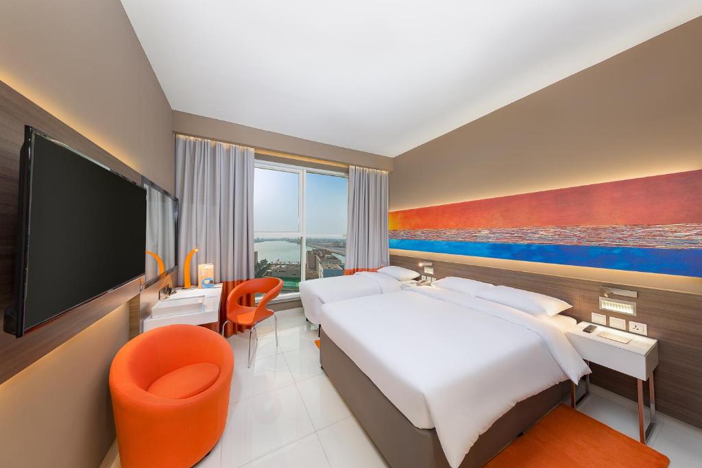Двухместный (Двухместный номер с 2 отдельными кроватями и дополнительной кроватью) отеля Citymax Hotel Ras Al Khaimah, Рас-эль-Хайма