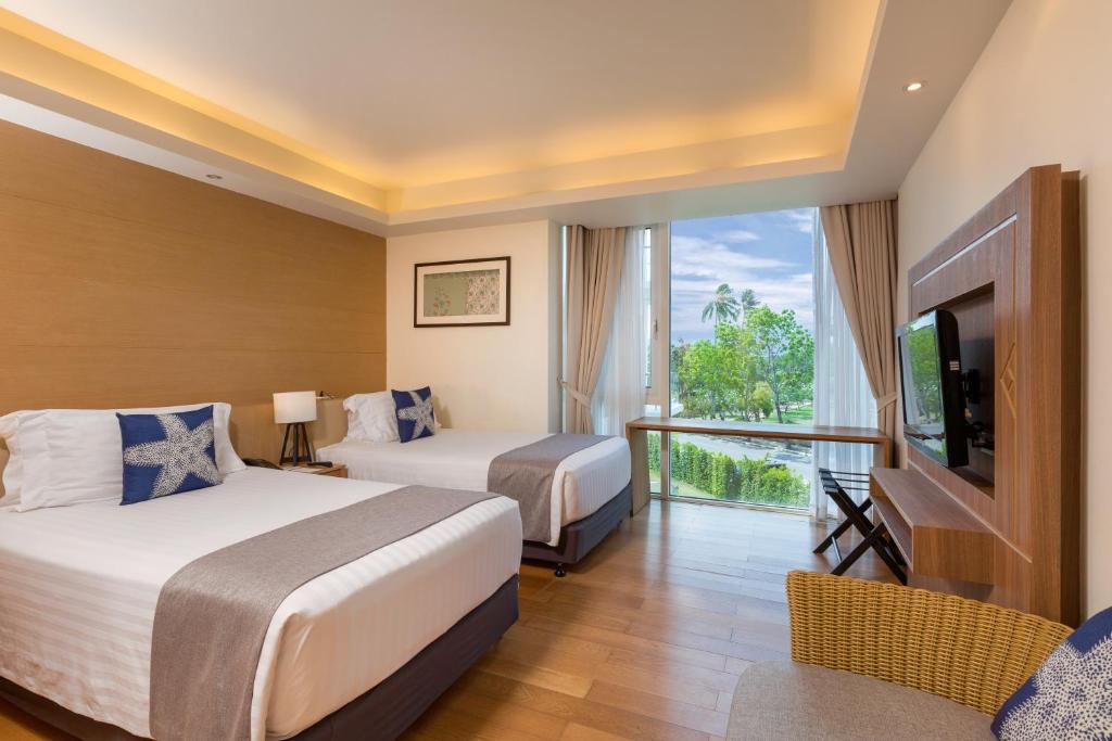 Сьюит (LB2B: Люкс Residence с 2 спальнями и балконом) курортного отеля Grand West Sands Resort & Villas Phuket, Пхукет