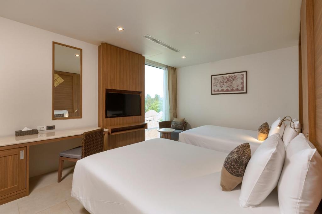 Сьюит (LL1N: Люкс Residence с 1 спальней, без балкона) курортного отеля Grand West Sands Resort & Villas Phuket, Пхукет