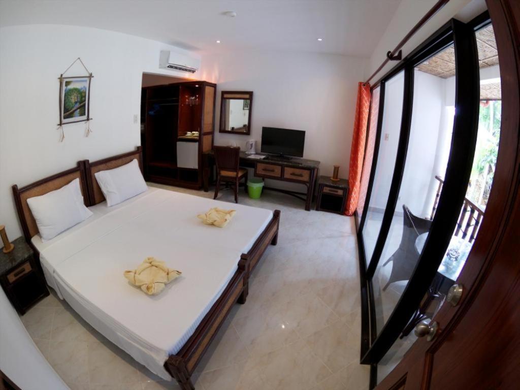 Семейный (Семейный номер с балконом) курортного отеля Alona Vida Beach Resort, Панглао