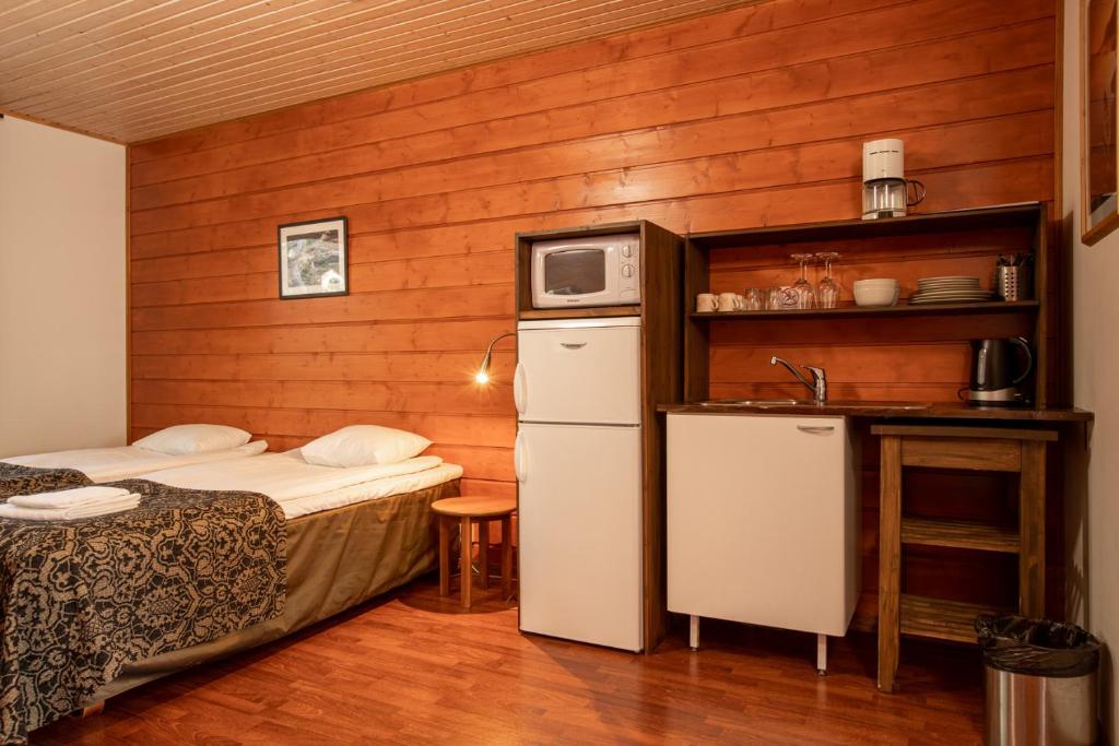 Двухместный (Просторный двухместный номер с 2 отдельными кроватями) гостевого дома Seikkailulaakso, Порвоо