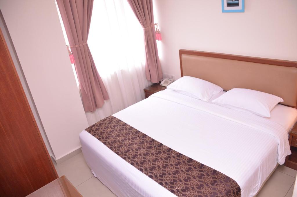 Двухместный (Стандартный двухместный номер с 1 кроватью) отеля Hotel Palm Inn Butterworth, Пенанг