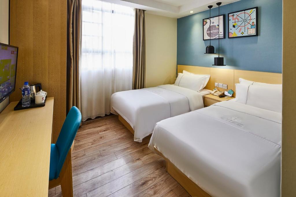 Двухместный (Бюджетный двухместный номер с 2 отдельными кроватями) отеля Yingshang Hotel - Xi Men Kou, Гуанчжоу