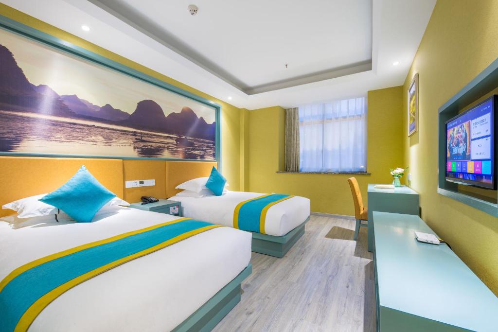 Двухместный (Двухместный номер бизнес-класса с 2 отдельными кроватями) отеля Yiwu Justin Hotel, Иу