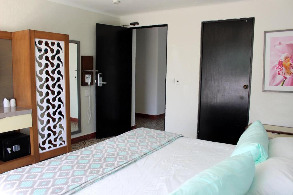Двухместный (Номер с кроватью размера «king-size») отеля Hotel Berny, Исла-Мухерес