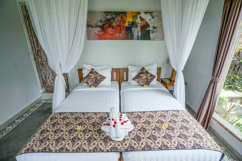 Двухместный (Двухместный номер с 1 кроватью или 2 отдельными кроватями и видом на бассейн) курортного отеля KTS Authentic Balinese Villas, Чангу