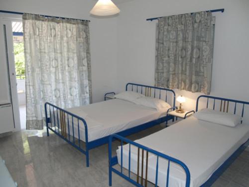 Двухместный (Бюджетный двухместный номер с 1 кроватью или 2 отдельными кроватями) апарт-отеля karavagelis rooms, Ровиес
