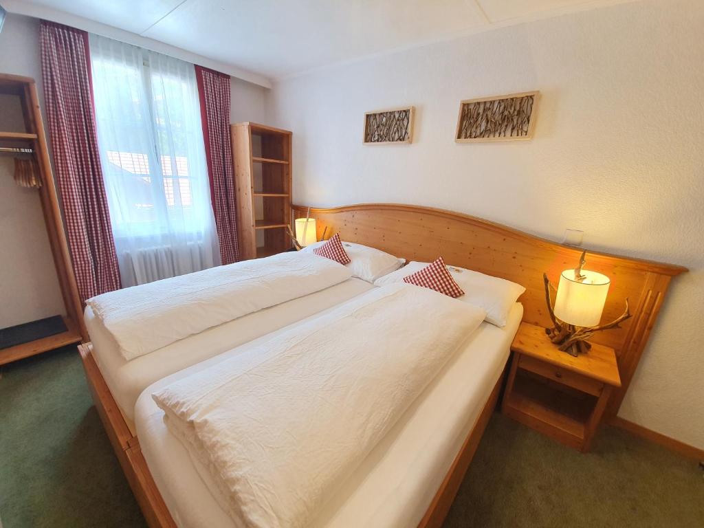 Двухместный (Стандартный двухместный номер с 1 кроватью) отеля Hotel Bernerhof Grindelwald, Гриндельвальд