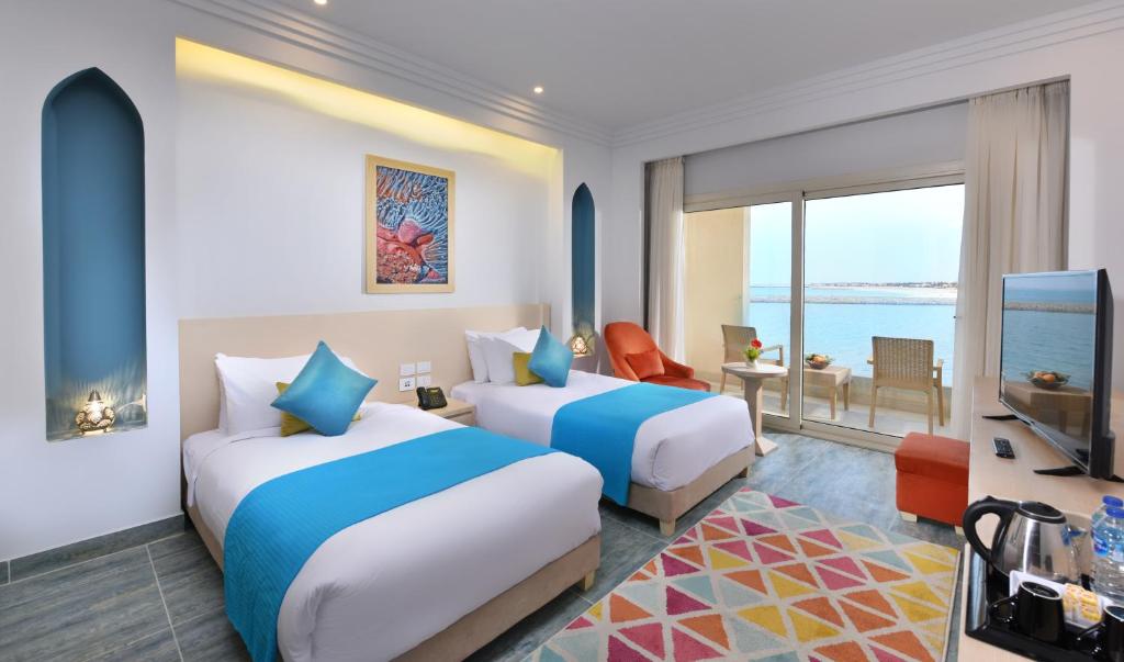 Двухместный (Двухместный номер Делюкс с видом на лагуну) курортного отеля Hotelux La Playa Alamein, Эль-Аламейн