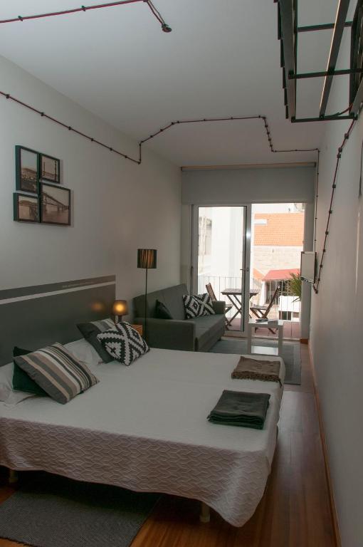 Двухместный (Улучшенный двухместный номер с 2 отдельными кроватями) гостевого дома Pensao O Laranjeira, Виана-ду-Каштелу