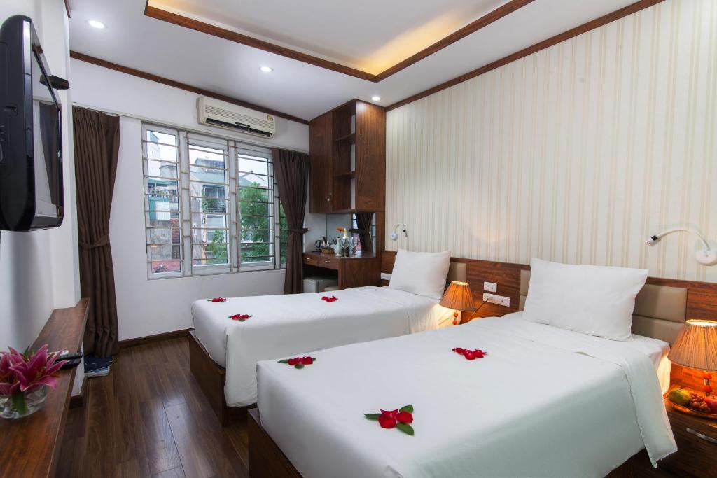 Двухместный (Двухместный номер Делюкс с 2 отдельными кроватями) отеля Hanoi Bel Ami Hotel, Ханой