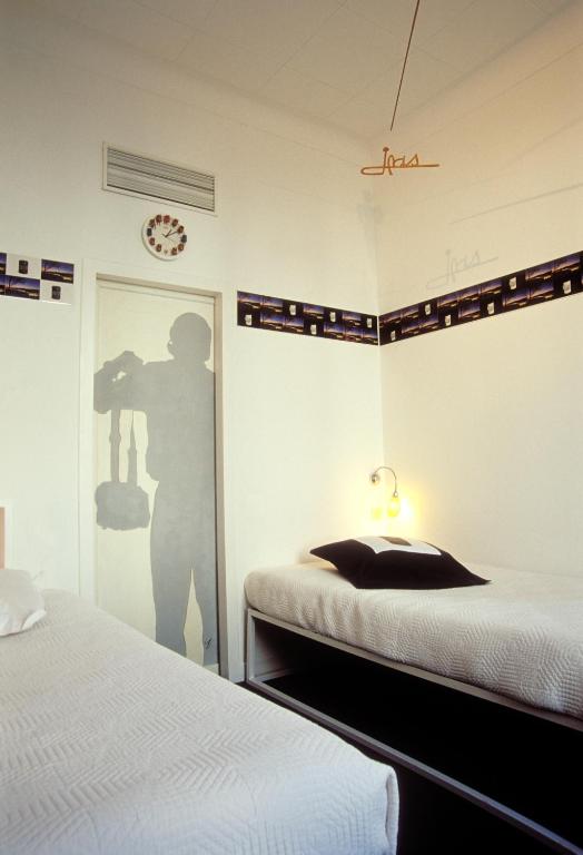 Двухместный (Стандартный двухместный номер с 1 кроватью или 2 отдельными кроватями - Intimity) отеля Hôtel Windsor, Ницца