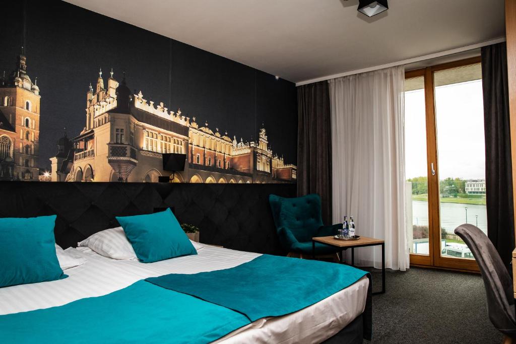 Двухместный (Двухместный номер Делюкс с 2 отдельными кроватями и видом на реку) отеля Hotel Pod Wawelem, Краков
