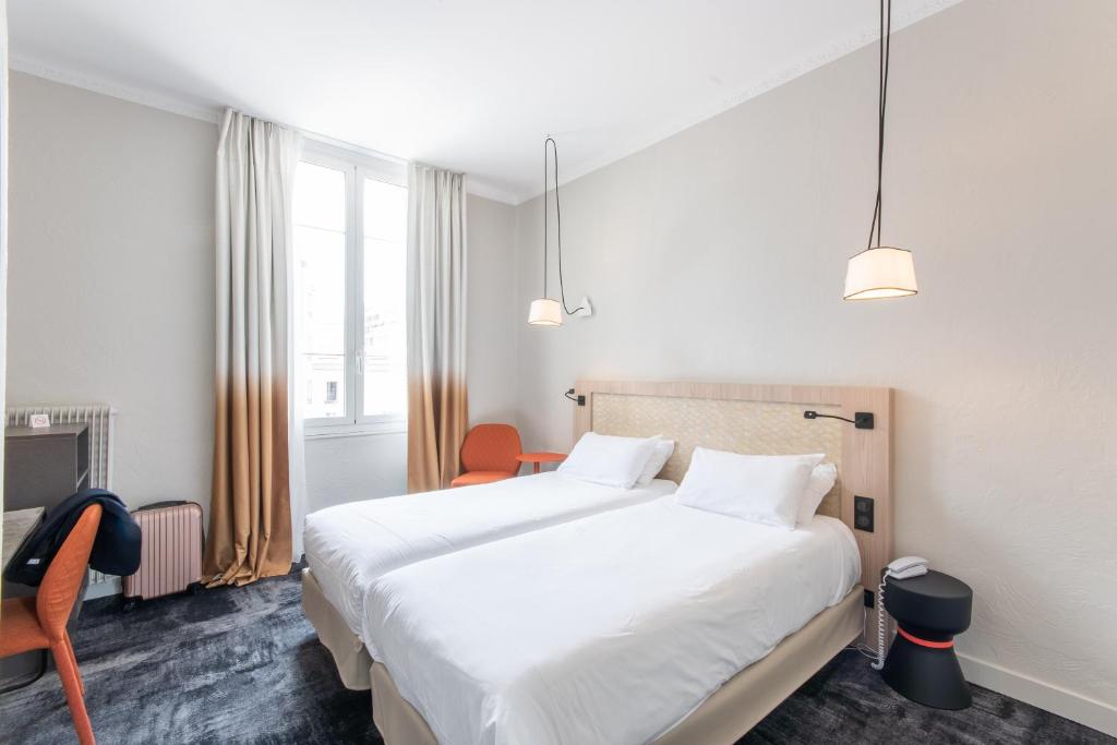 Двухместный (Двухместный номер с 2 отдельными кроватями) отеля Hôtel Vendôme, Ницца