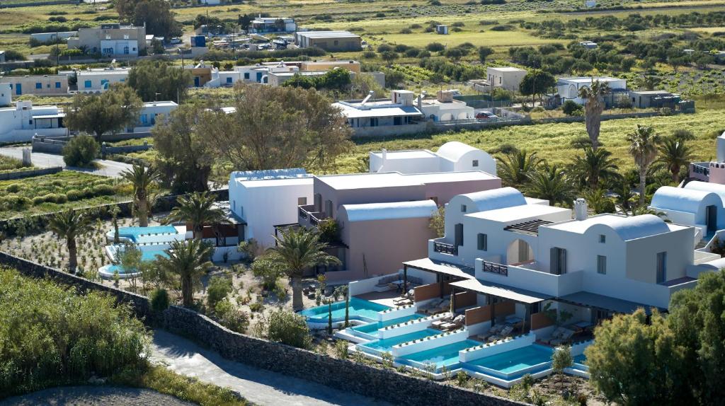 Сьюит (Улучшенный люкс с собственным бассейном) отеля 9 Muses Santorini Resort, Периволос