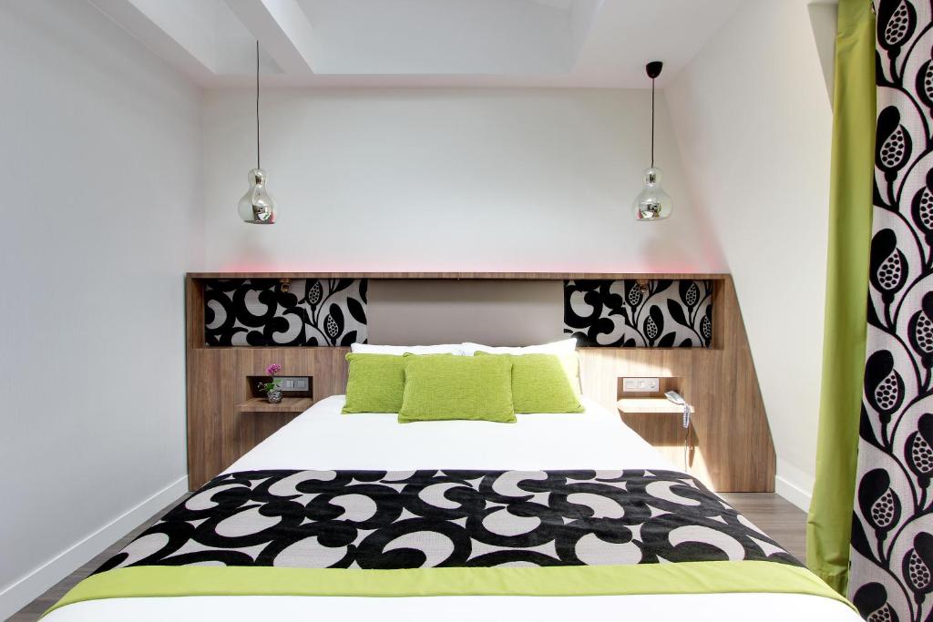 Двухместный (Улучшенный двухместный номер с 1 кроватью) отеля Hotel Alhambra, Париж