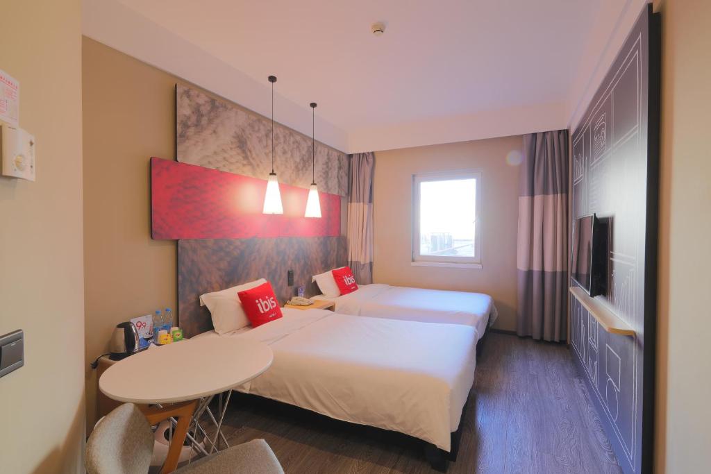 Двухместный (Двухместный номер бизнес-класса с 2 отдельными кроватями) отеля Hotel Ibis Qingdao Ningxia, Циндао
