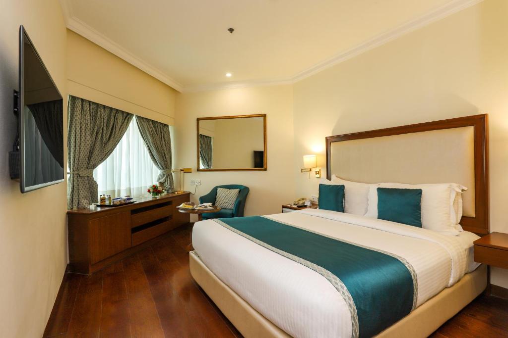 Двухместный (Двухместный номер Делюкс с 1 кроватью) отеля Hotel The Royal Plaza, Нью-Дели