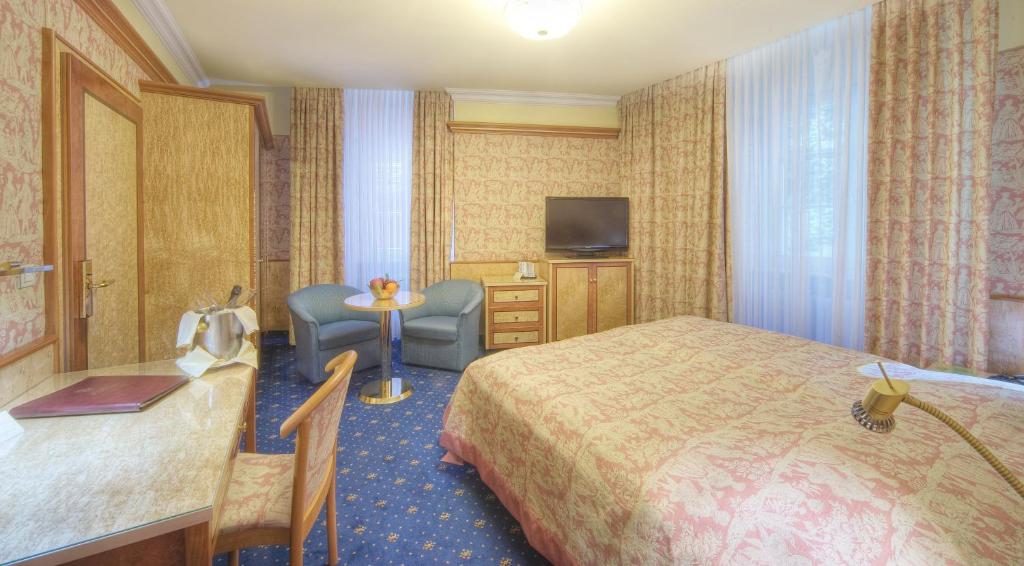 Одноместный (Одноместный номер с видом на горы) отеля Häcker´s Grand Hotel, Висбаден