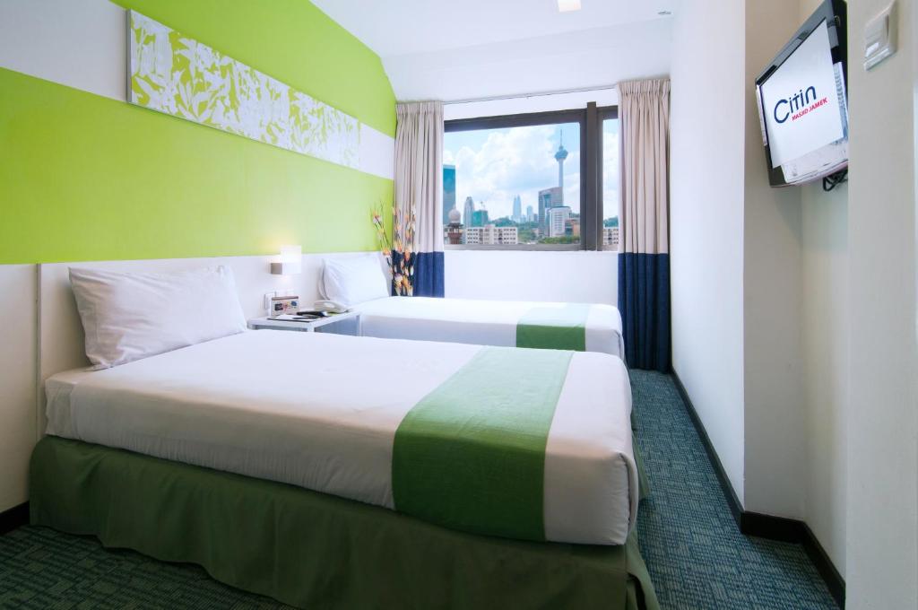 Двухместный (Улучшенный двухместный номер с 1 кроватью или 2 отдельными кроватями) отеля Citin Hotel Masjid Jamek by Compass Hospitality, Куала-Лумпур