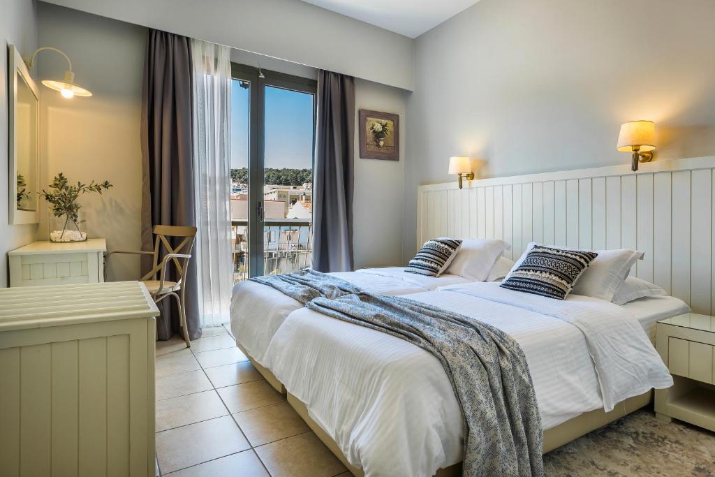 Двухместный (Бюджетный двухместный номер с 1 кроватью или 2 отдельными кроватями) отеля Tourist Hotel, Аргостолион